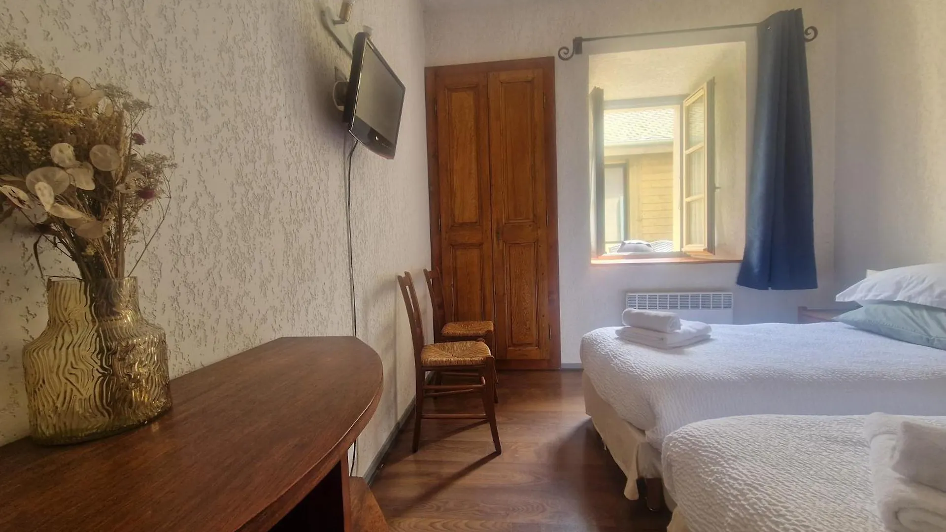 L'Auberge De Mens Hotell
